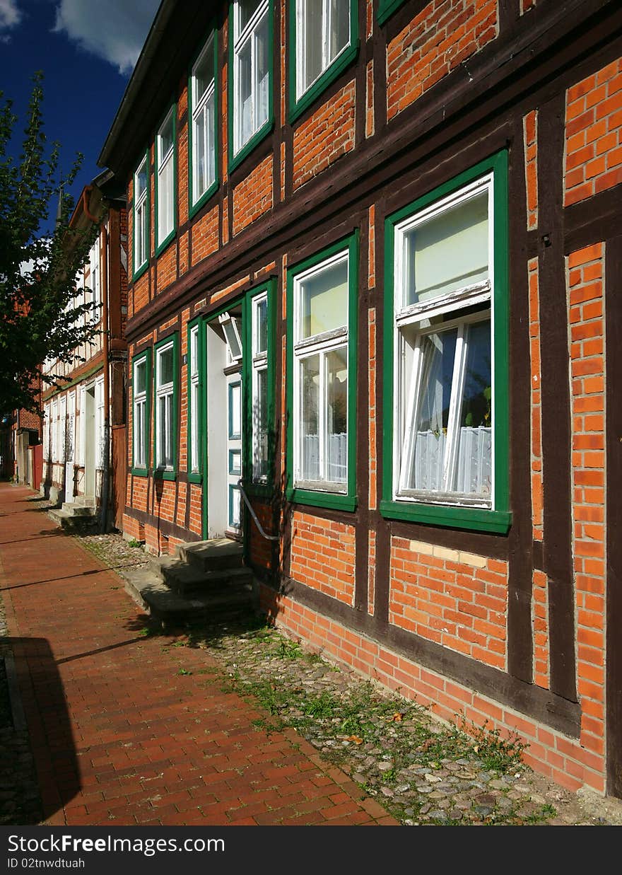 A row of houses in the East German town of Doemitz, Mecklenburg-Vorpommern, displays the German timber-framed style. A row of houses in the East German town of Doemitz, Mecklenburg-Vorpommern, displays the German timber-framed style.