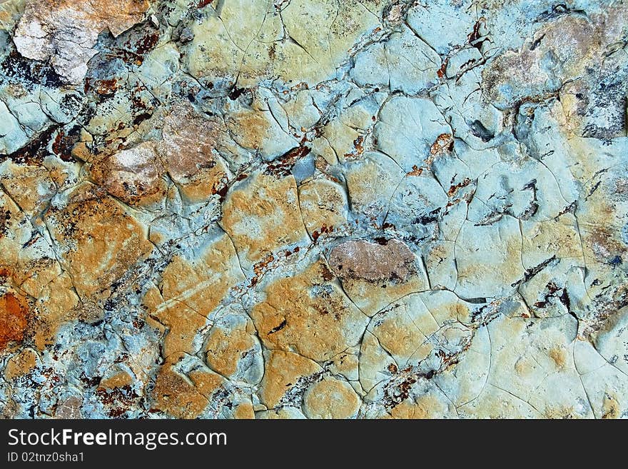 A sample of natural mountain rock texture. A sample of natural mountain rock texture