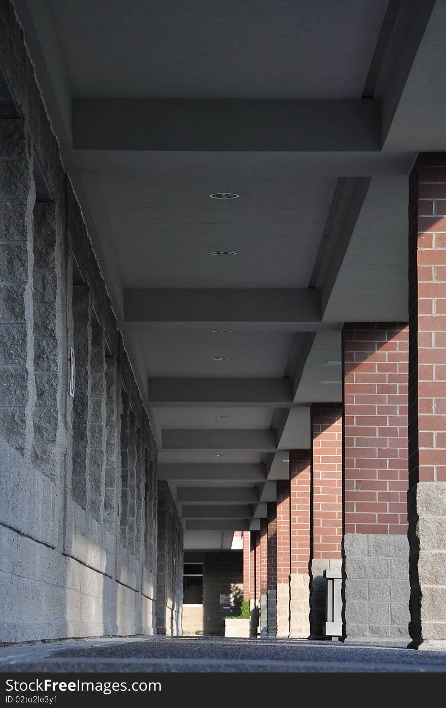 Columned hallway with sun shadows