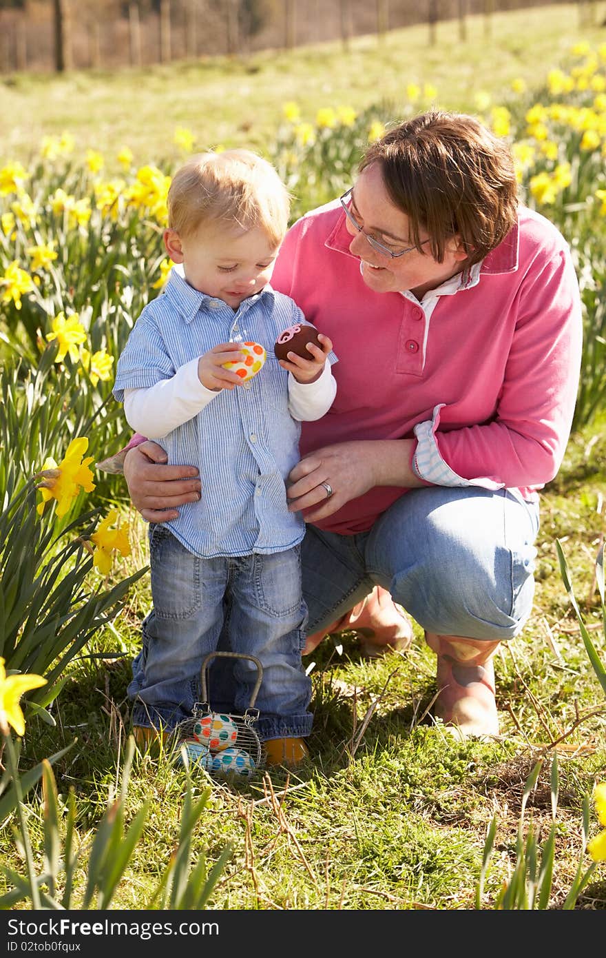 Mother And Son On Easter Egg Hunt