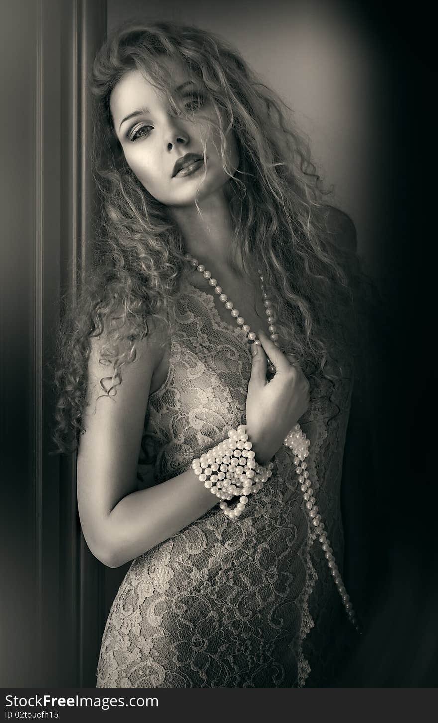 Beautiful woman with pearl beads.