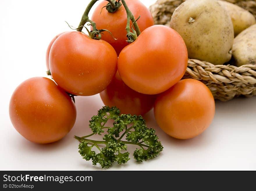 Tomatoes and potatoes with parsley. Tomatoes and potatoes with parsley