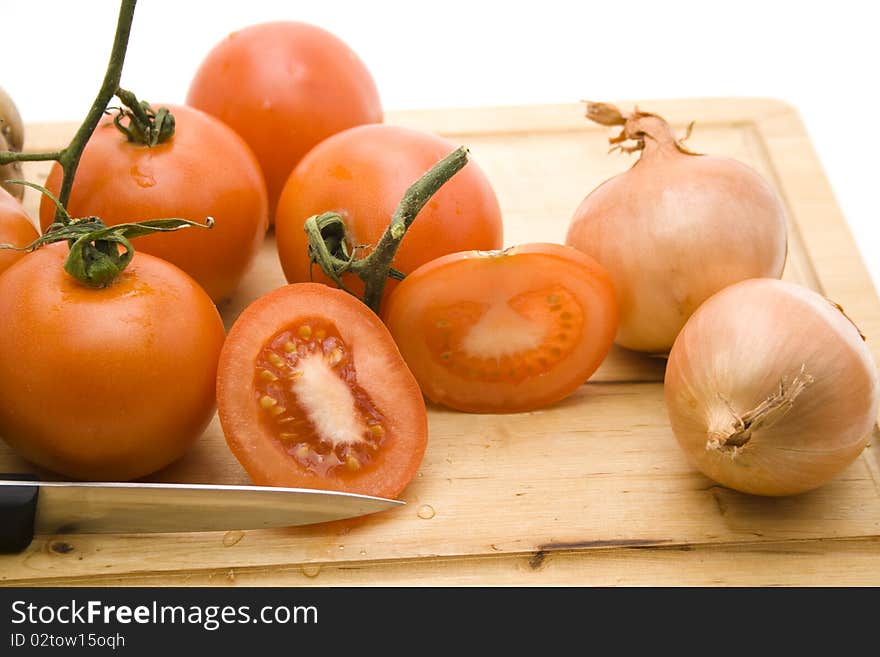 Tomatoes and potatoes with onion. Tomatoes and potatoes with onion