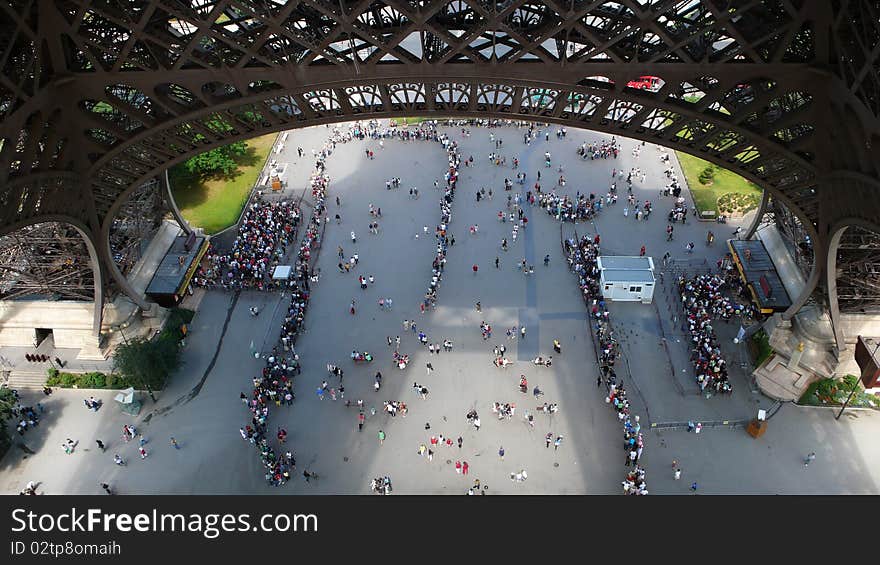 Lines of people for elevator as viewed from the Eiffel Tower. Lines of people for elevator as viewed from the Eiffel Tower