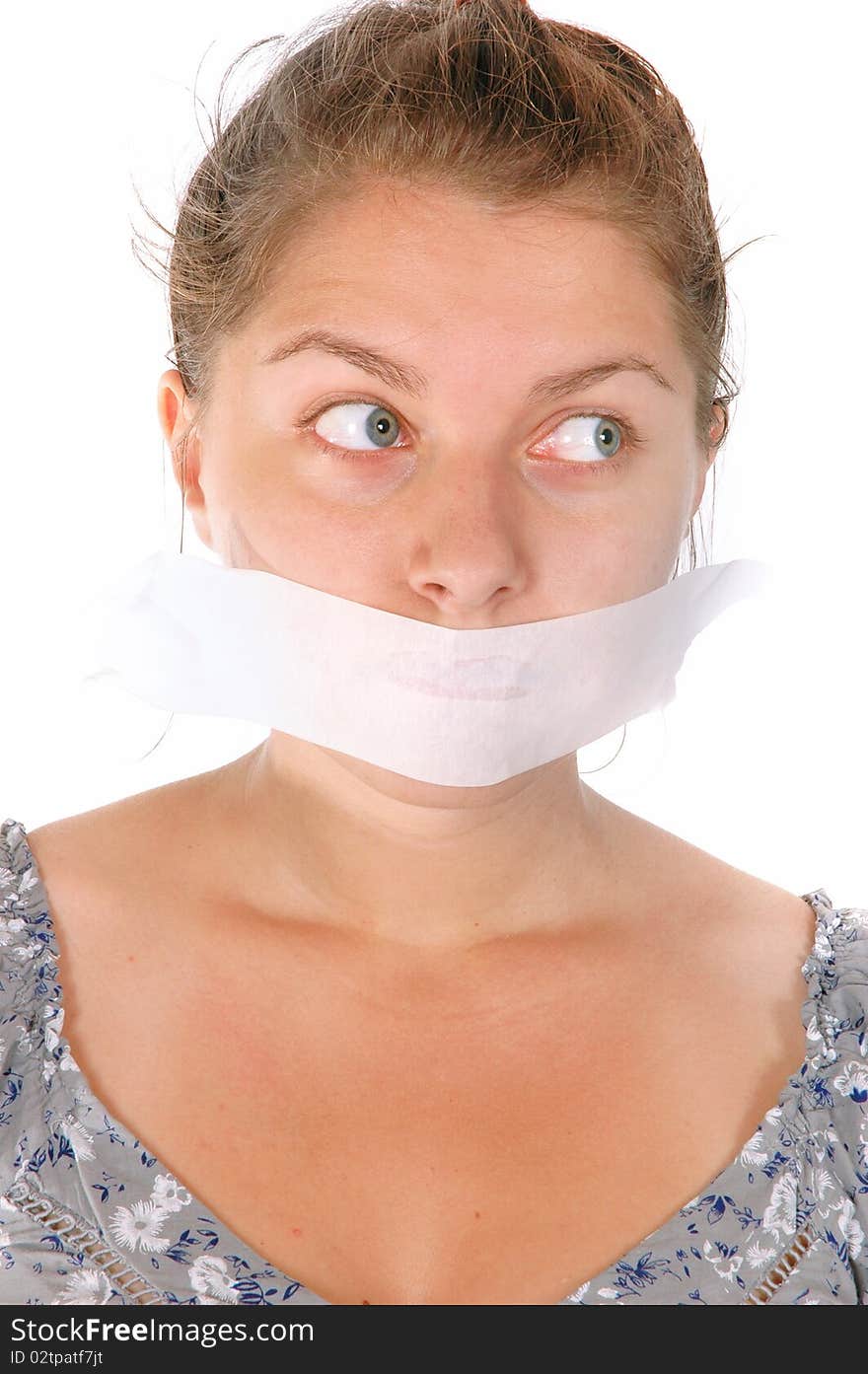 Young female with tape on her mouth isolated on white background. Young female with tape on her mouth isolated on white background