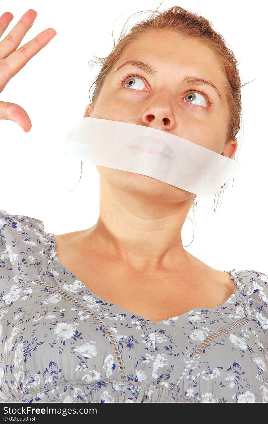 Young female with tape on her mouth isolated on white background. Young female with tape on her mouth isolated on white background