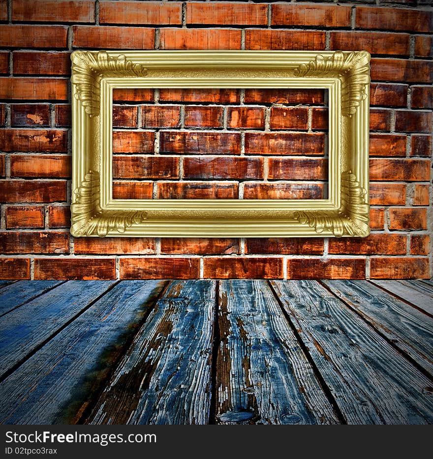 Gold Picture Frame On Brick Wall And Wood Floor