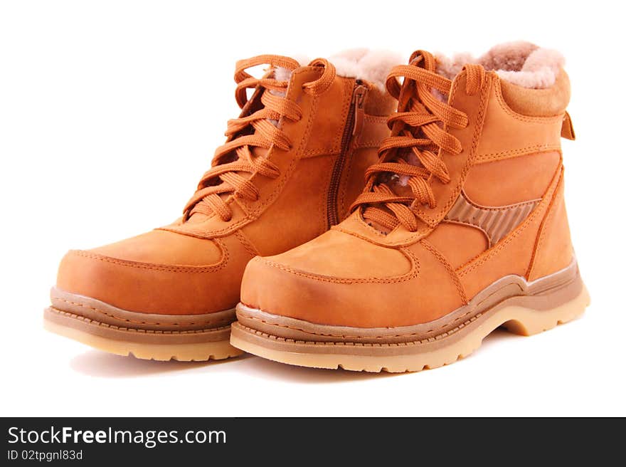 Brown boot's with a lace on a white background. Brown boot's with a lace on a white background