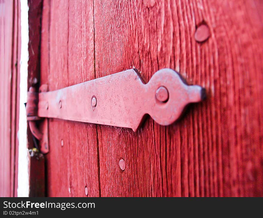 Hinge on an old door. Hinge on an old door