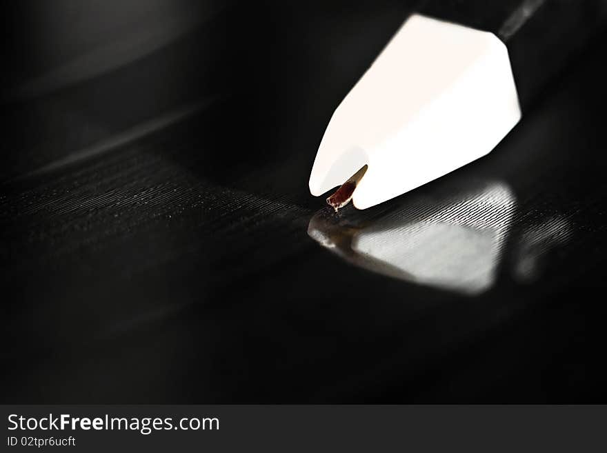 Turntable playing vinyl audio record