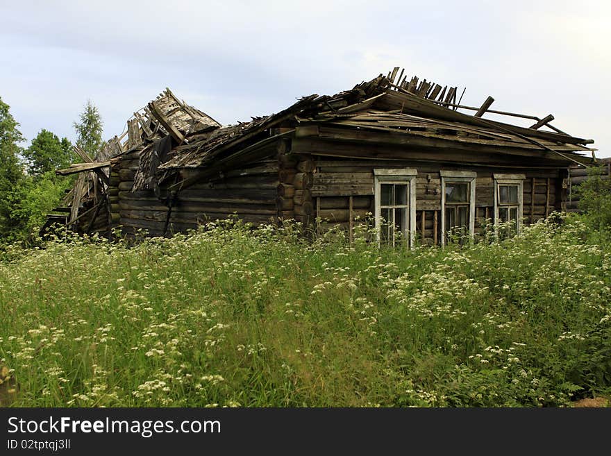 The thrown log hut in Russian countryside