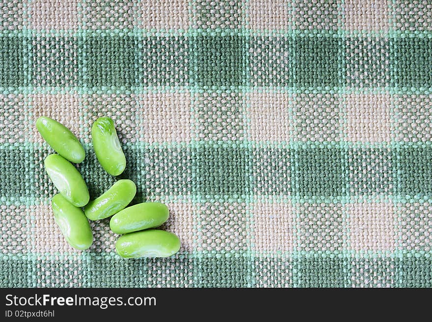 Vegetable kidney bean beans against on a cloth.