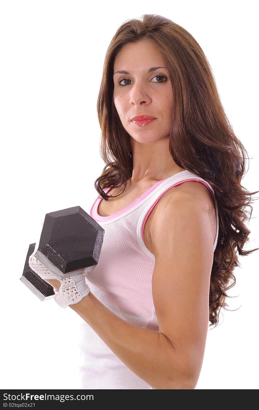 Shot of a woman curling weights