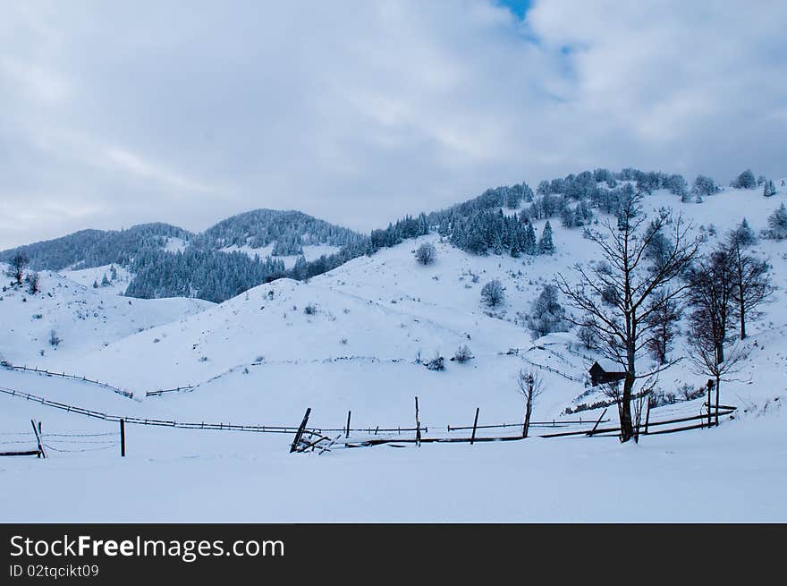 Isolated House in Mountains in Winter