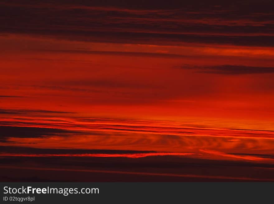 Autumn sun breaks at dawn in dorset backlighting cloud inversion. Autumn sun breaks at dawn in dorset backlighting cloud inversion