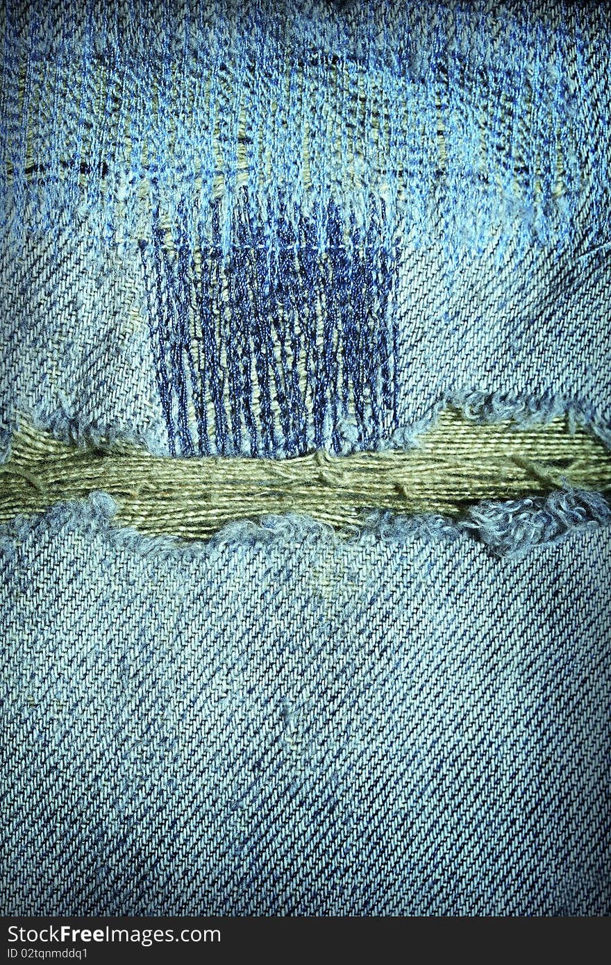 Close up old blue jeans