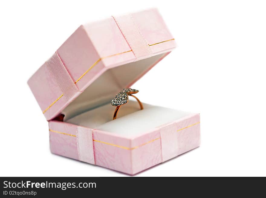 A wedding ring in the package on a white background