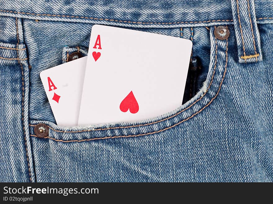 Two Aces in Jean front pocket for cheating concepts and success ideas. Two Aces in Jean front pocket for cheating concepts and success ideas