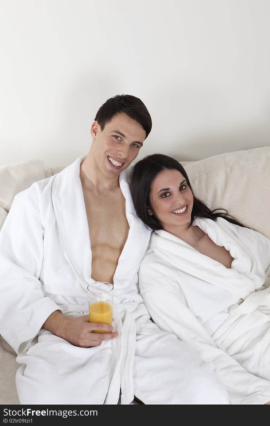 Sexy young couple in the morning having breakfast