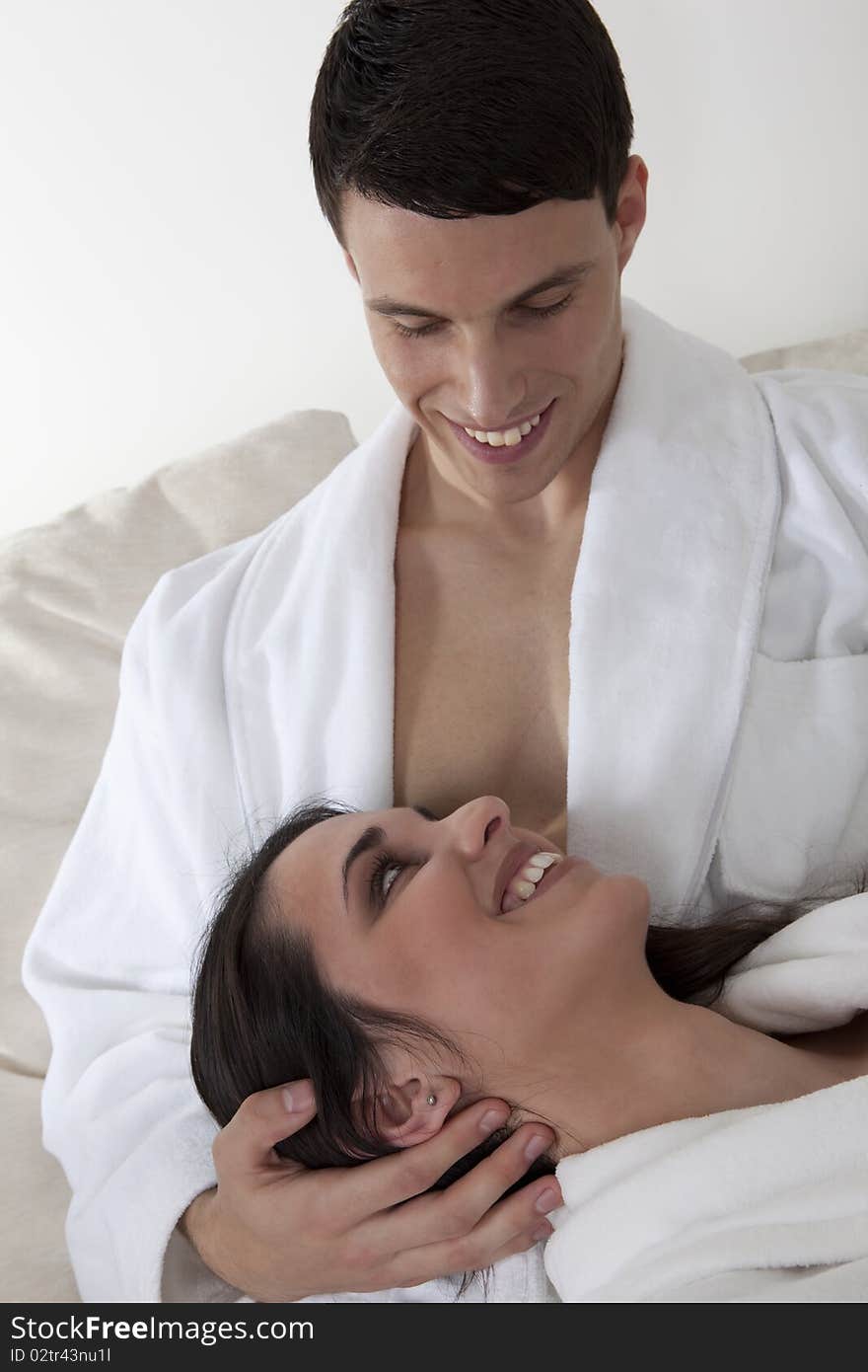 young smiling couple is having morning together in the appartment. young smiling couple is having morning together in the appartment