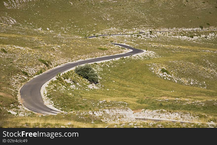 Asphalt road with many curves in Durmitor, Montenegro