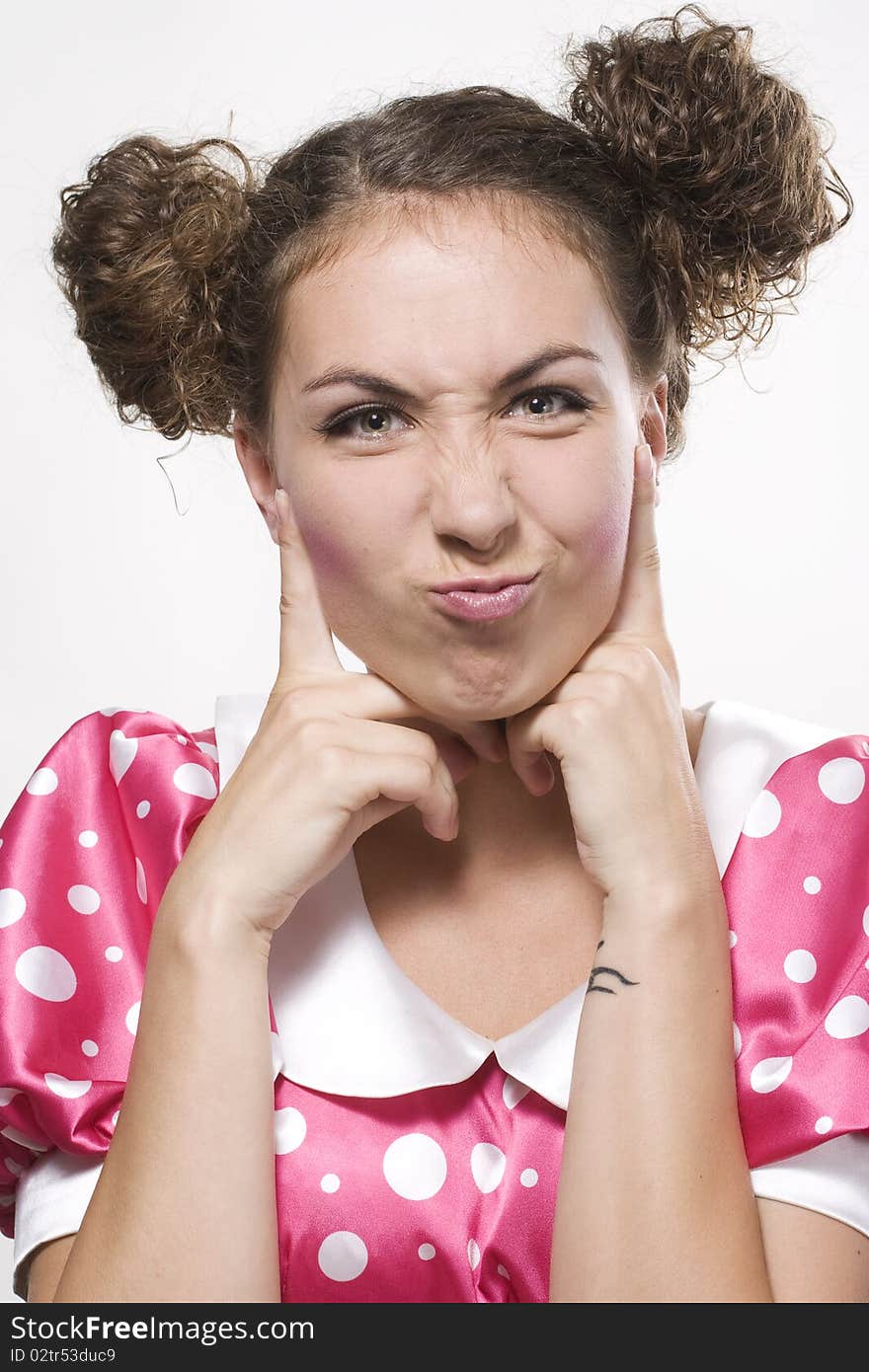 Young beautiful woman making a funny face