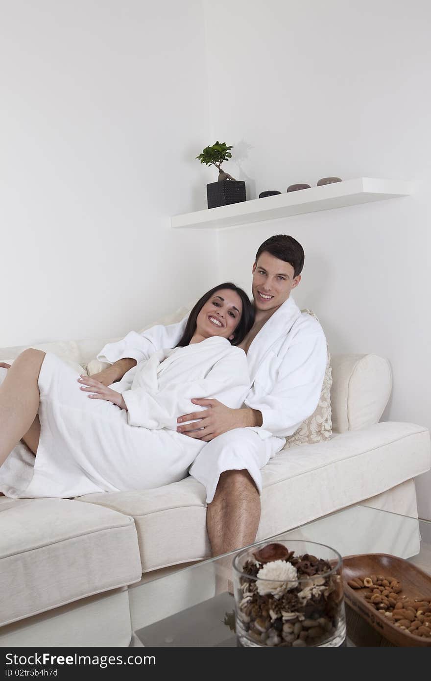 young smiling couple is having morning together in the appartment. young smiling couple is having morning together in the appartment