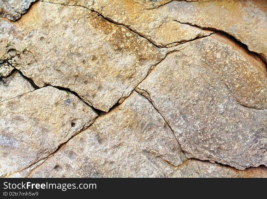 A sample of natural mountain rock texture. A sample of natural mountain rock texture