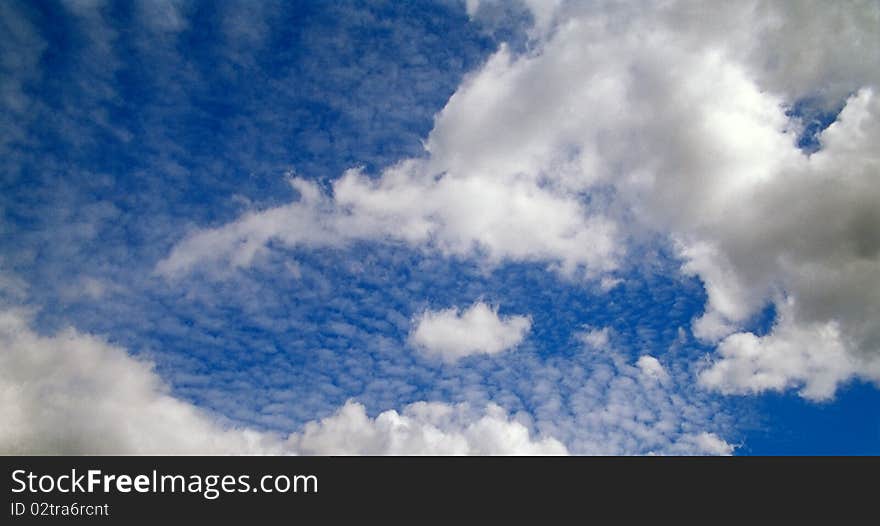 Blue sky and clouds. Day.