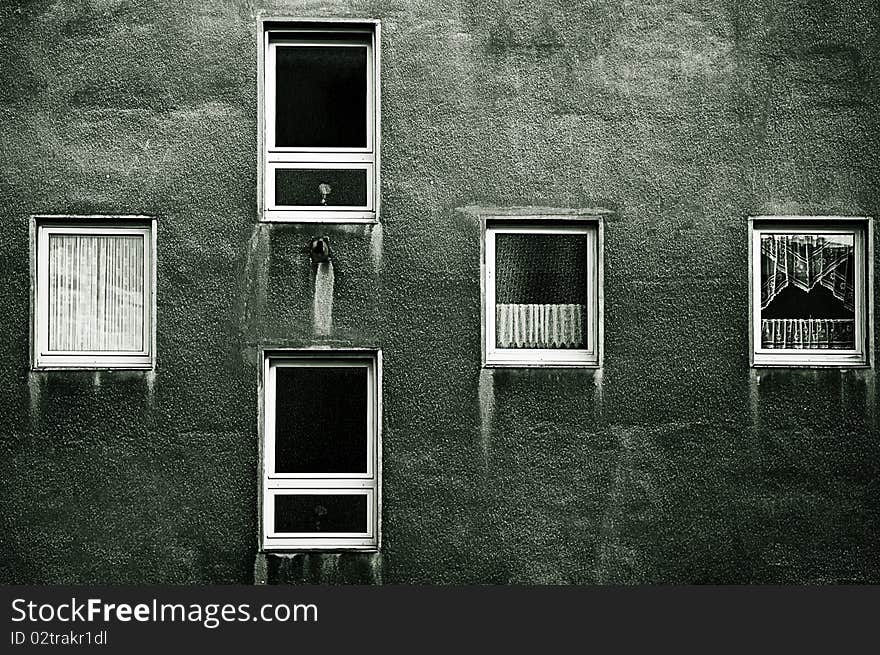 Edited picture of a grey wall in the middle of a city. Edited picture of a grey wall in the middle of a city