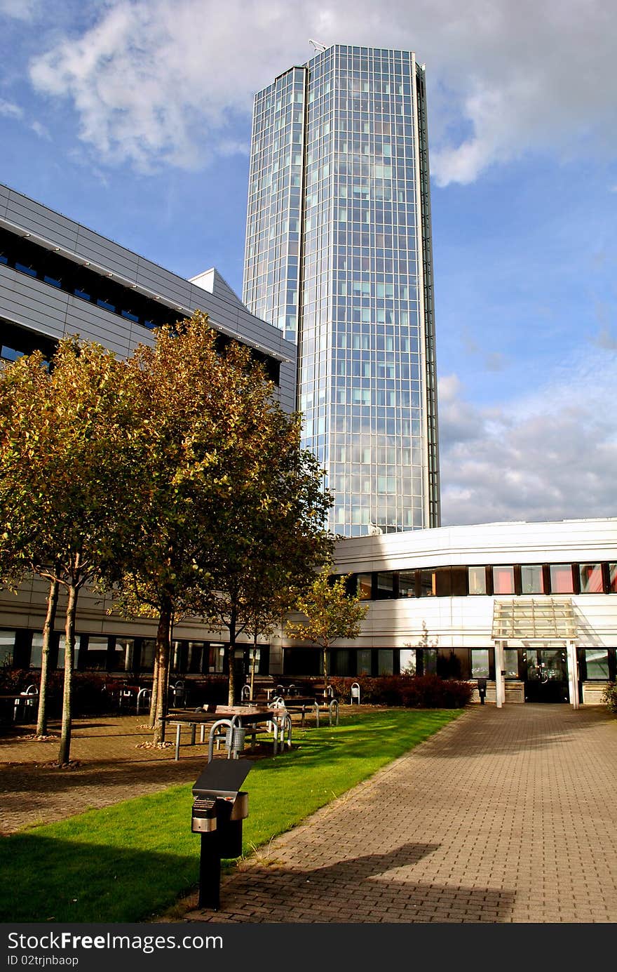 Big glass building and blue sky