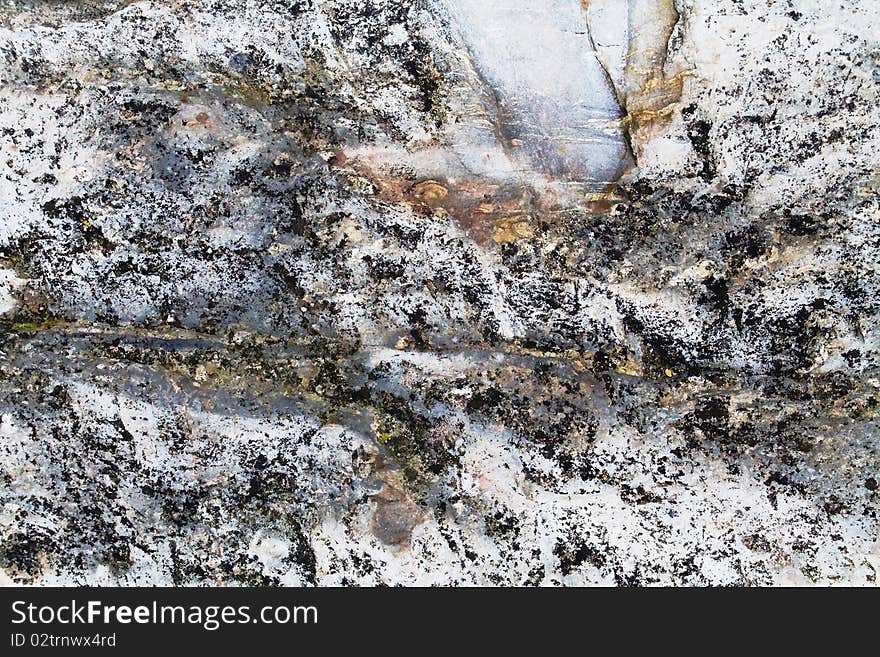 A sample of natural mountain rock texture. A sample of natural mountain rock texture