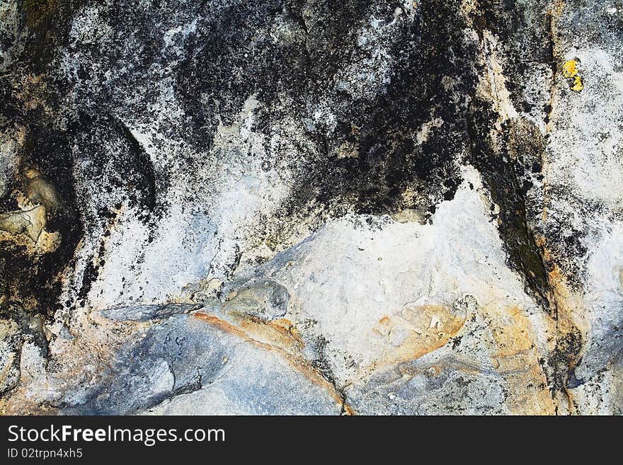 A sample of natural mountain rock texture. A sample of natural mountain rock texture