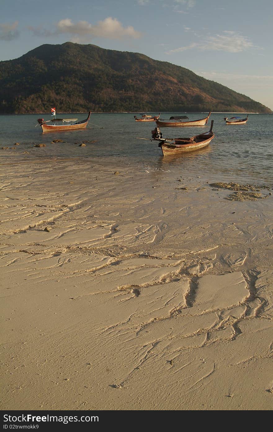 Longtail boats near Lepe island in Andaman sea , Thailand. Longtail boats near Lepe island in Andaman sea , Thailand