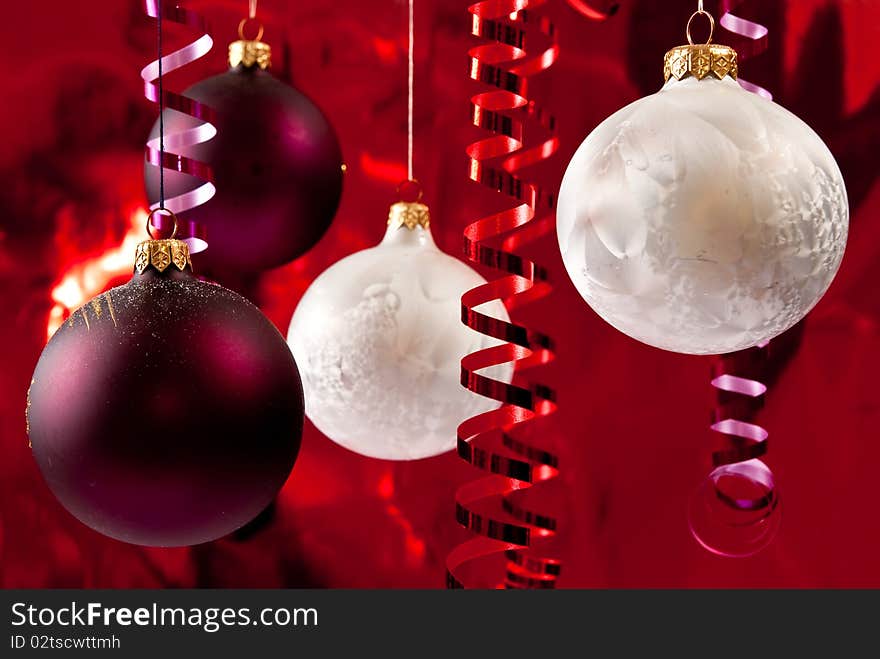 Christmas baubles and ribbons on red background. Christmas baubles and ribbons on red background