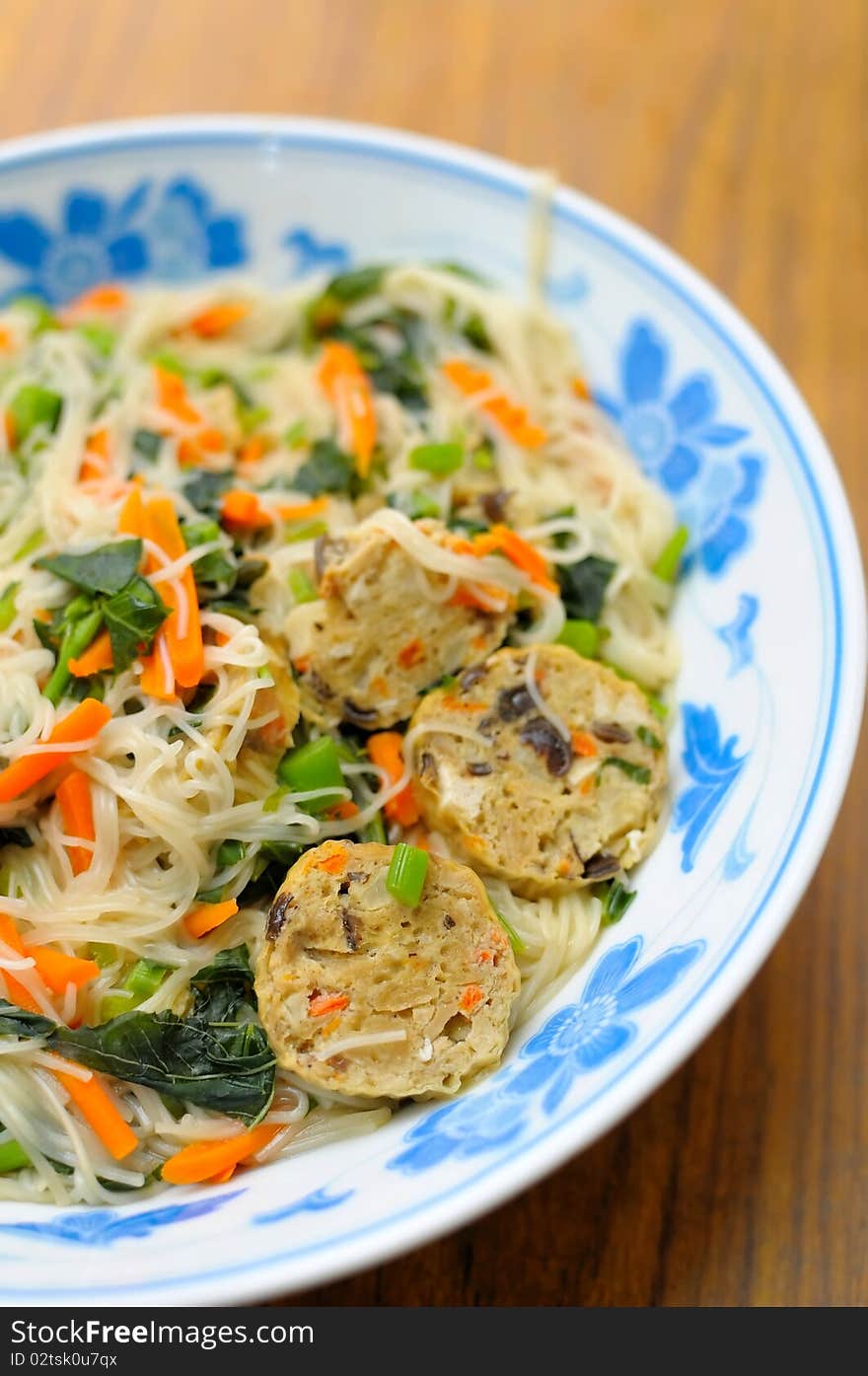 Sumptuous looking Chinese style vegetarian noodles. Made with various ingredients and vegetables. For concepts such as healthy lifestyle, and food and beverage.