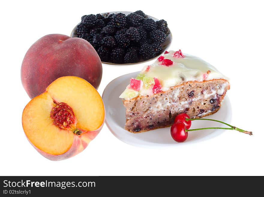 Various fruits and cake, isolated on white