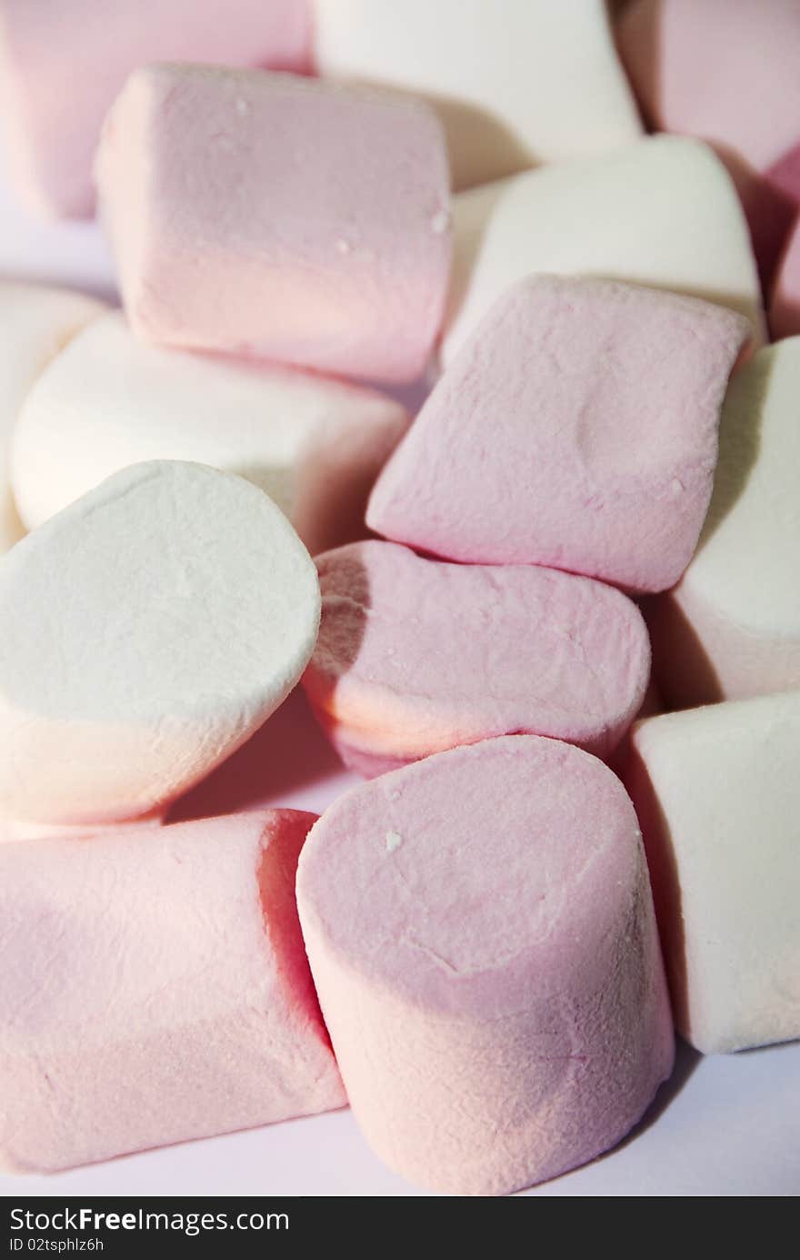 Close up of pink and white marshmallows