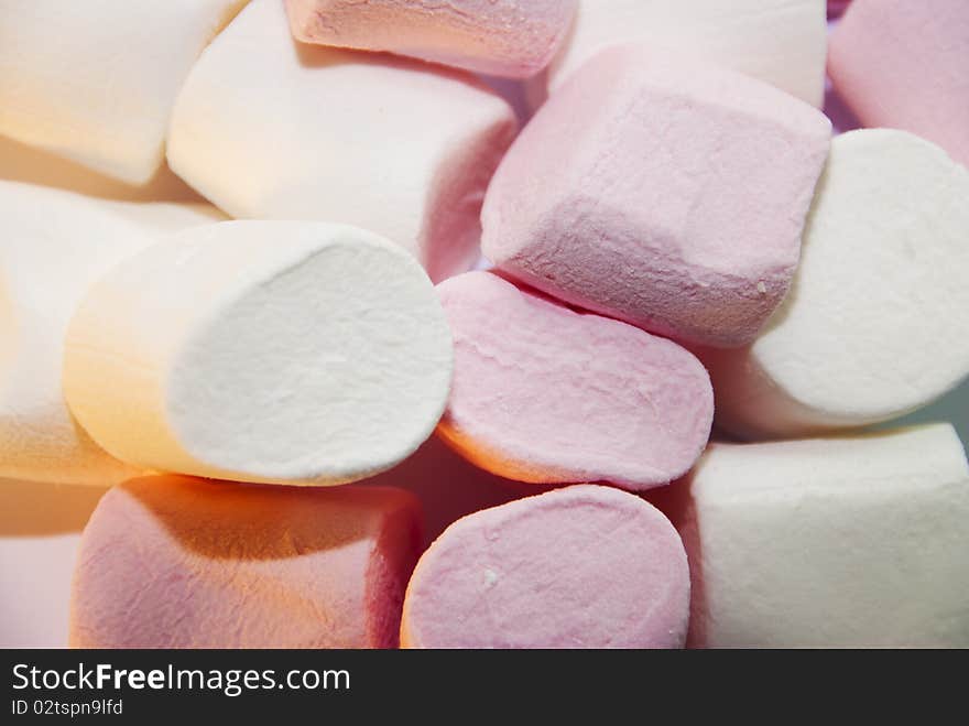 Close up of pink and white marshmallows