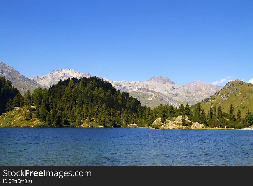 Alpine lake Cavloc Engadine in Switzerland