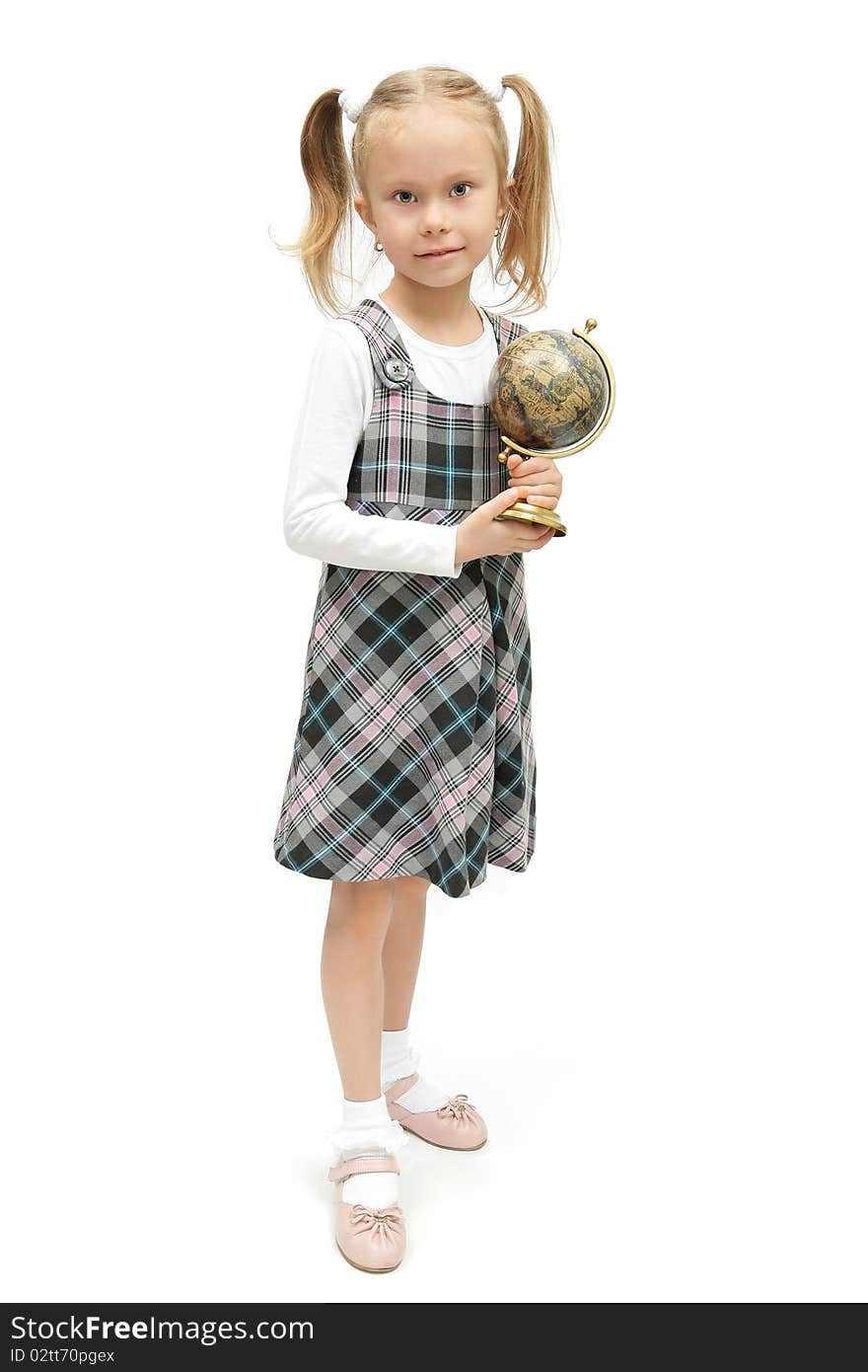 Cute little schoolgirl holding a globe studio shot on white background. Cute little schoolgirl holding a globe studio shot on white background