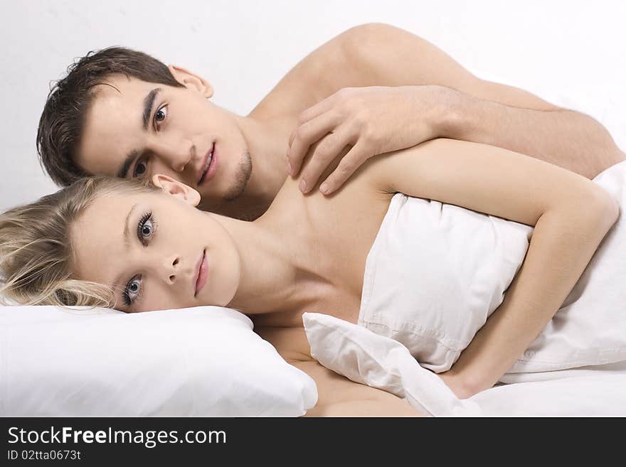 Couple sleeping together. Shallow depth of field with focus on the woman face.