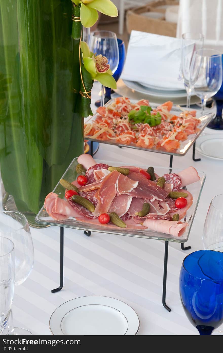 Tables set for a birthday party with hors d'oeuvres at a Hotel in Hollywood Fl. Tables set for a birthday party with hors d'oeuvres at a Hotel in Hollywood Fl.