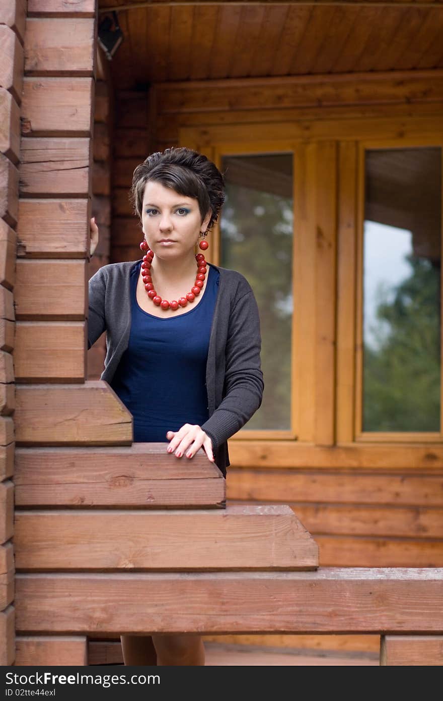 Girl On A Veranda