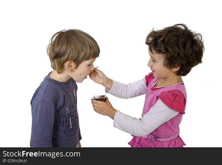 Two girls eating a candy