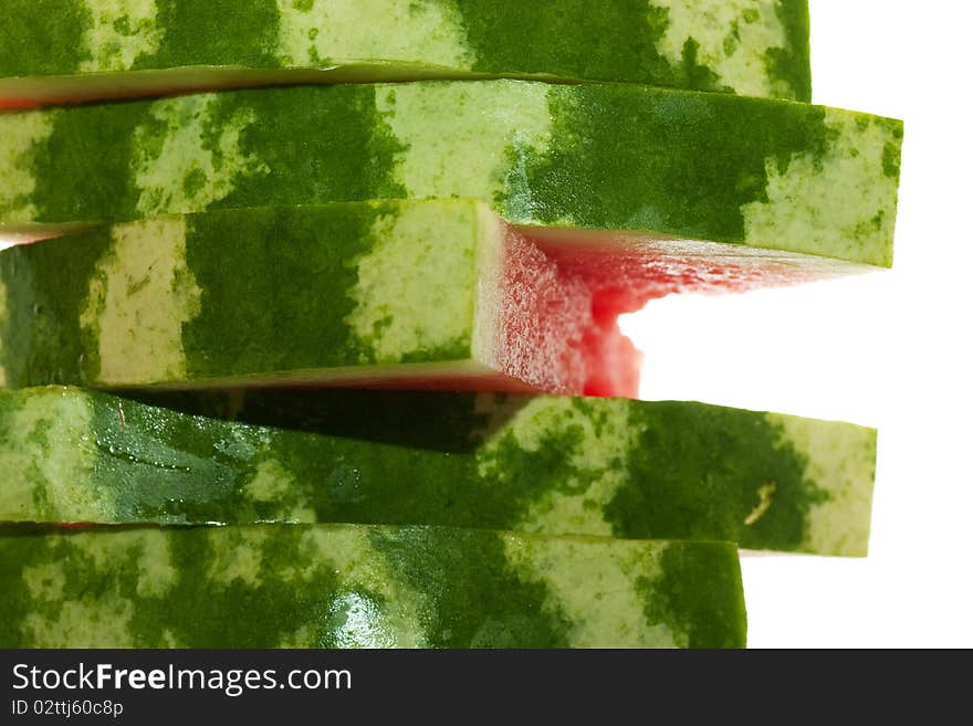 Stack of five pieces of watermelon isolated over white. Stack of five pieces of watermelon isolated over white.