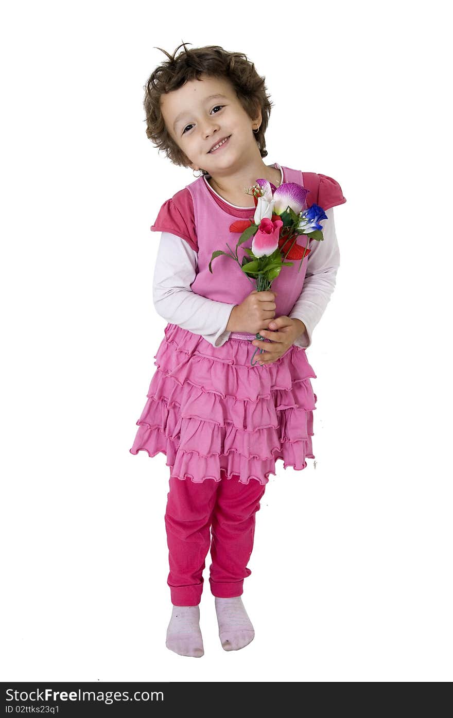 Cute young girl is holding flowers