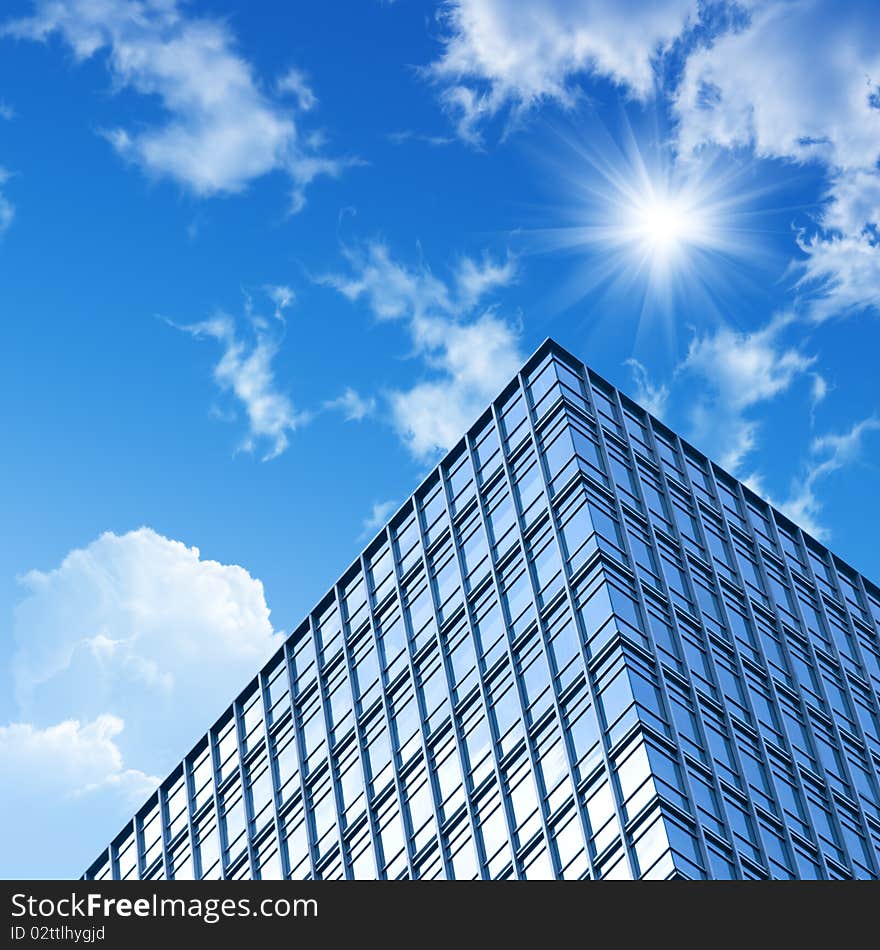 Ray on modern building glass wall