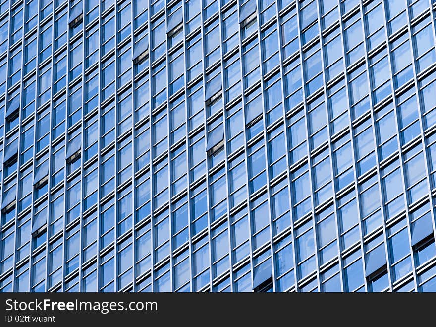 Ray on modern building glass wall