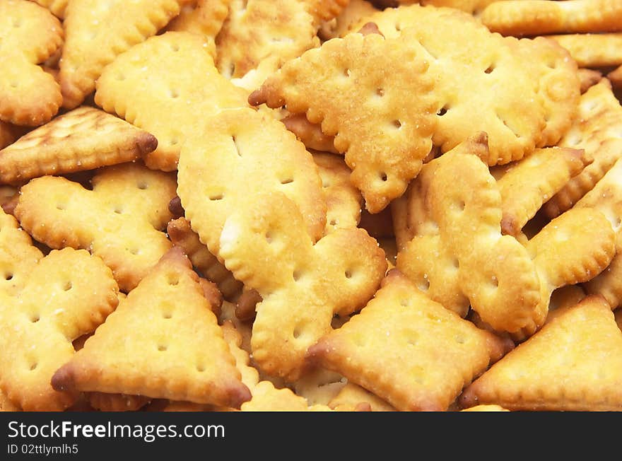 Fresh crackling crackers with salt close up. Fresh crackling crackers with salt close up